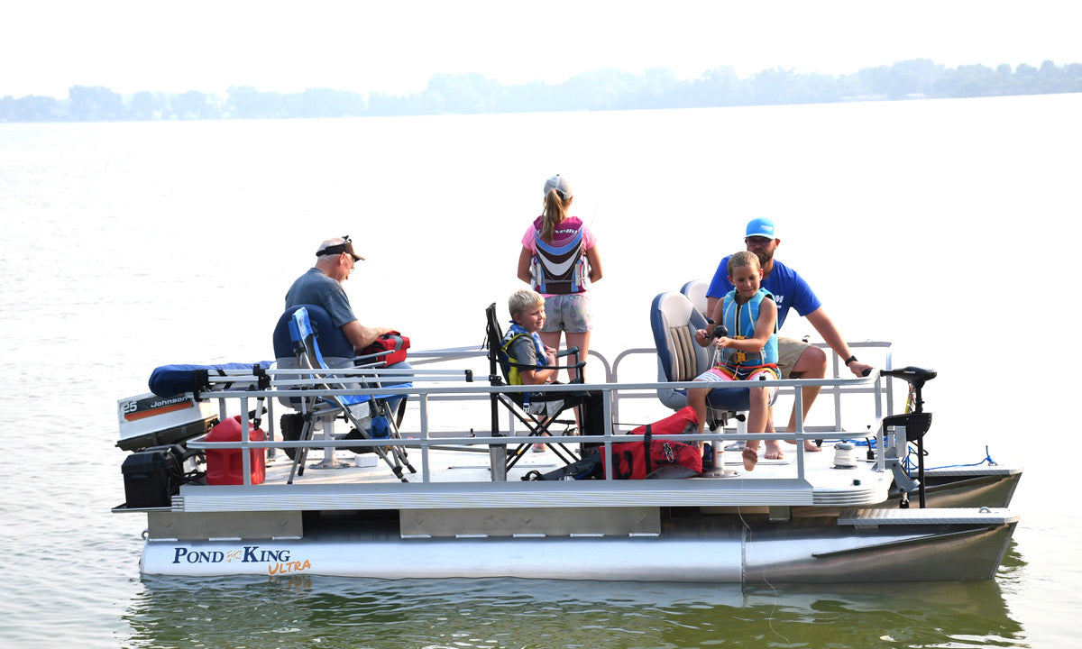 family on small pontoon