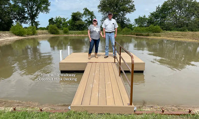 couple standing on dock