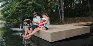 family fishing on floating dock